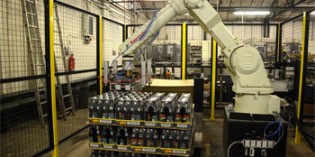 Palletising robot boosts competitiveness for beer bottler