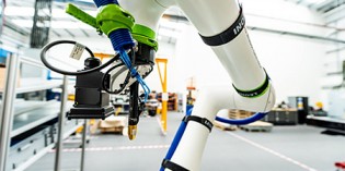 Vehicle electrification specialist uses cobots to increase productivity