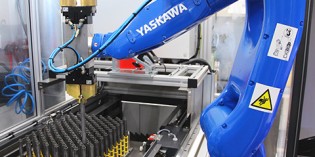 Robotic tending for automatic grinding machine