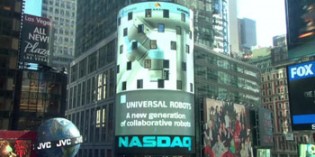 Robot arm rings the NASDAQ closing bell