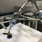 Universal robot eliminates heavy lifting for printer