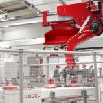 Güdel pivot arm robot overcomes height restrictions